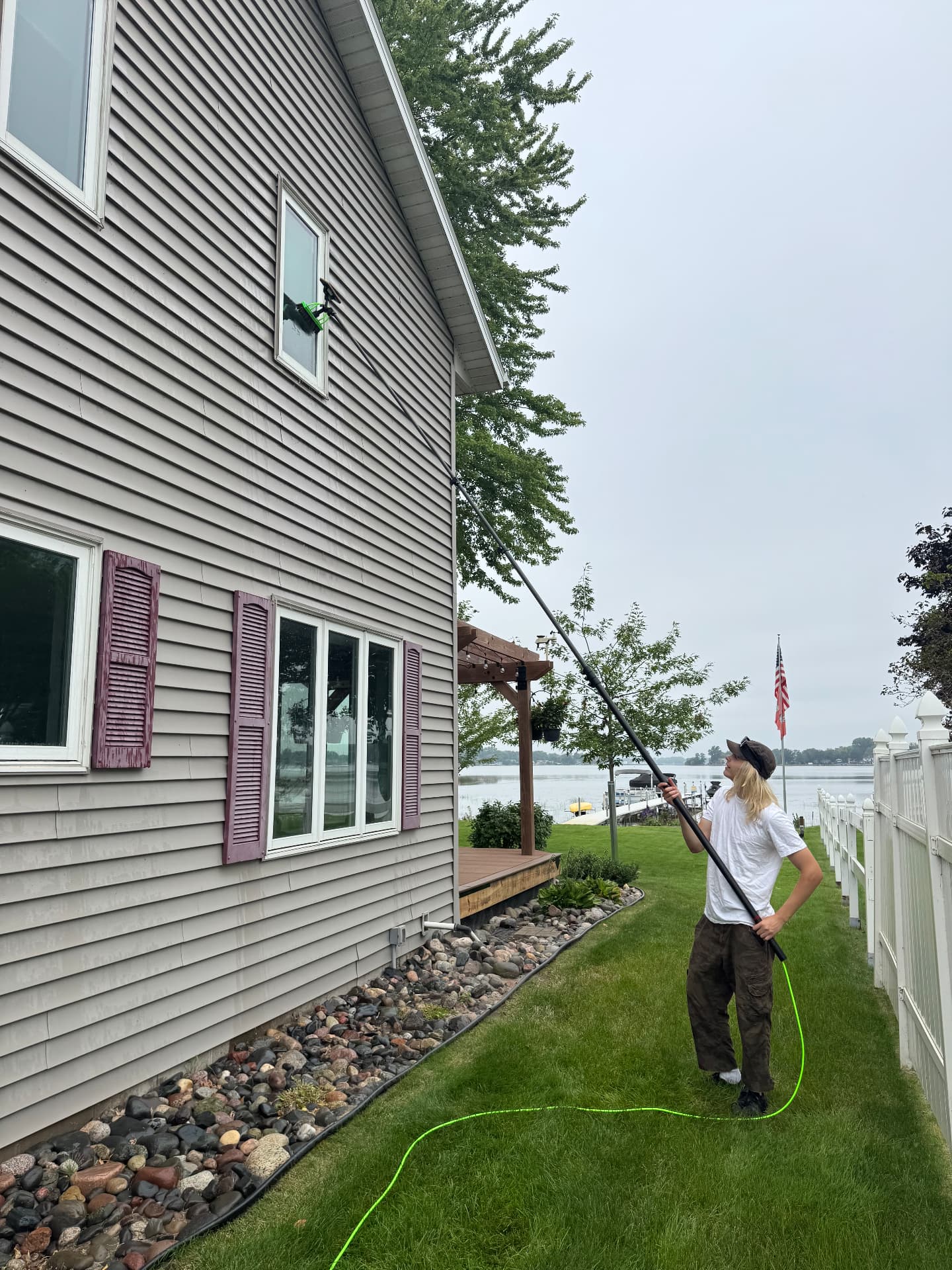 Prime Shine Cleaning using professional window-cleaning equipment