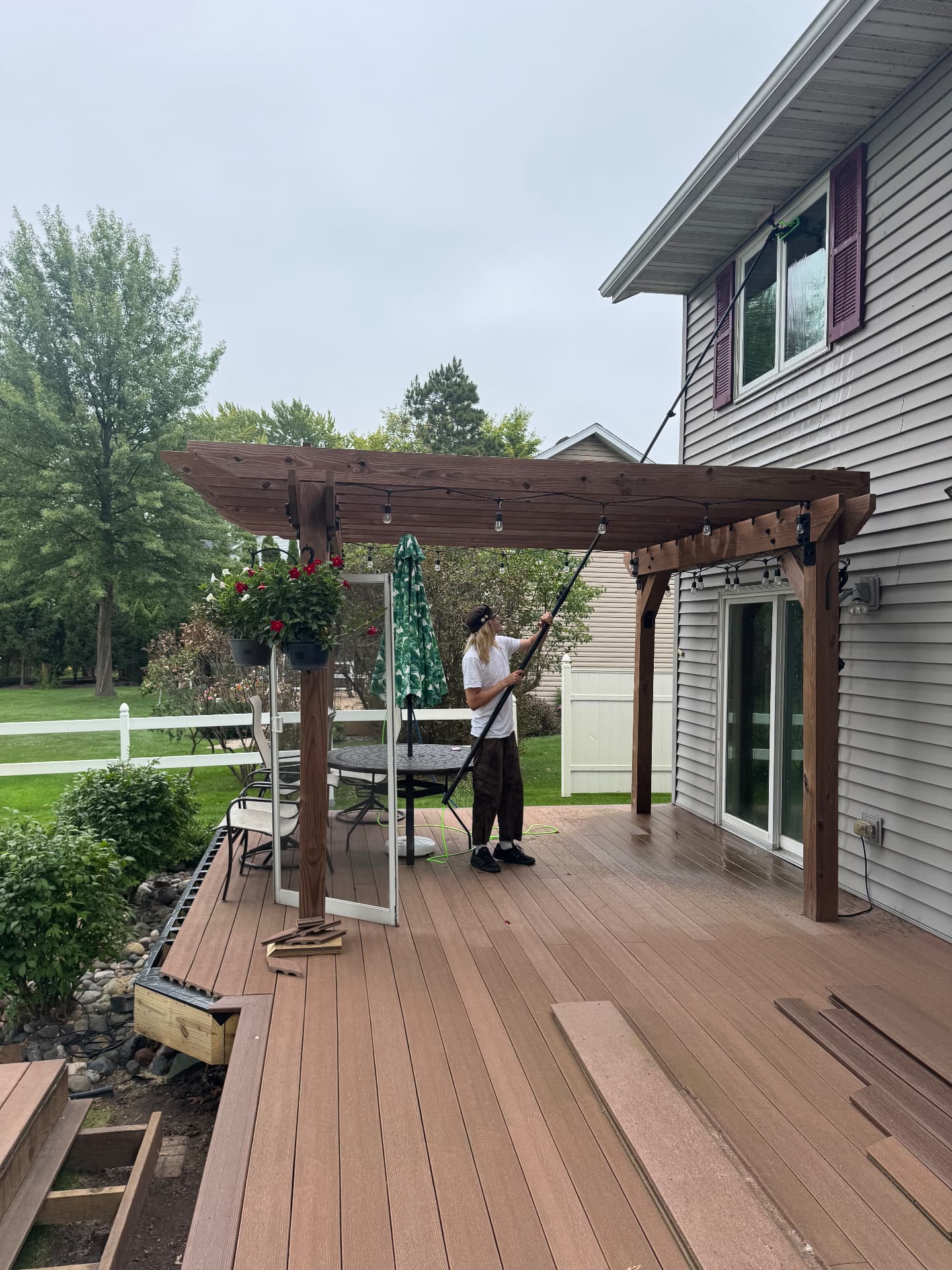 Prime Shine Cleaning technician working on exterior glass